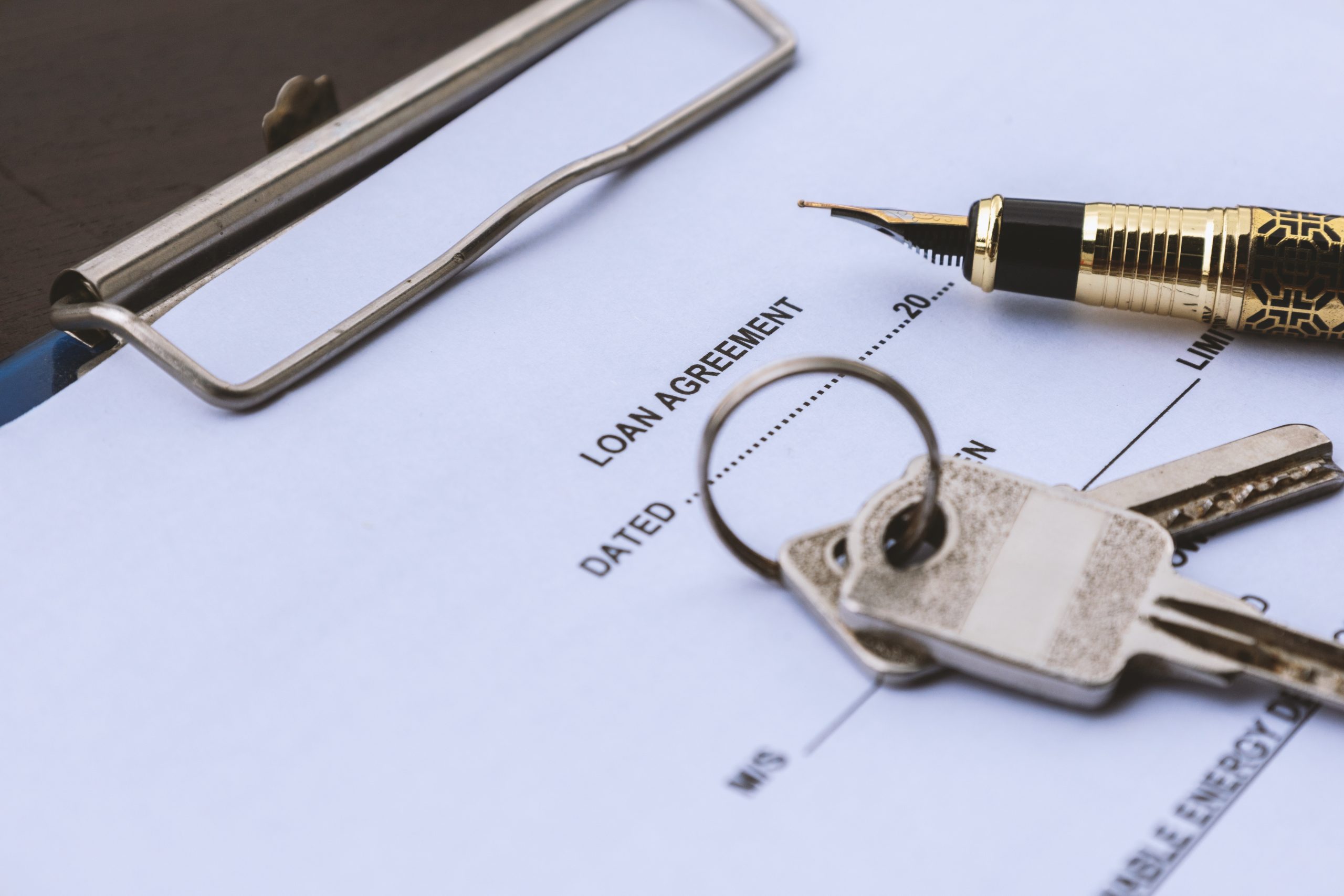 Loan agreement document with property keys, representing debt fund investing